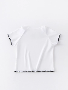 Back view of girls' white ice silk rib-knit T-shirt with black ruffled lace trim edges