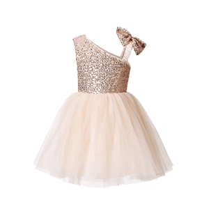 Detail of sequins bodice and shoulder bow on a sparkling pink tulle flower girl dress