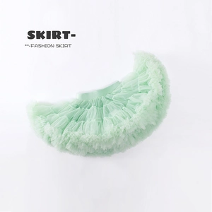Detailed view of layered mint green tulle tutu skirt with elastic waistband for girls