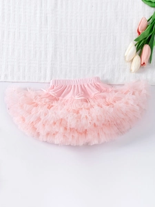 Jupe tutu rose multicouche élégante pour femmes avec un détail de nœud en ruban délicat
