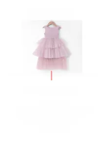 Detailed close-up of pink layered tulle princess dress with 95% cotton fabric label