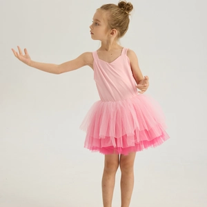 Detail view of pink gradient tutu skirt layers on children ballet dance dress