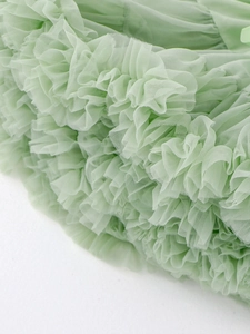 Mint green multilayered tulle tutu skirt featuring dense ruffles and clouds-like fluffiness