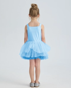 Detail view showing layered sky blue mesh tutu skirt and matching sequin princess shoes