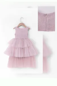 Detailed back view of a pink sleeveless tutu dress with zipper and layered mesh skirt