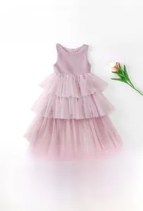 Detailed view of pink sleeveless girls princess dress with layered tulle and knit texture