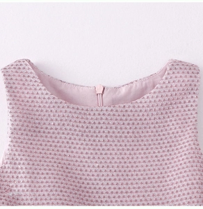 Detail of pink sequin dress neckline with a high-quality invisible back zipper