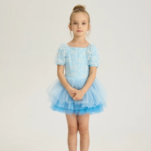 Detail of light blue girls ballet dress with puff sleeves and white daisy print