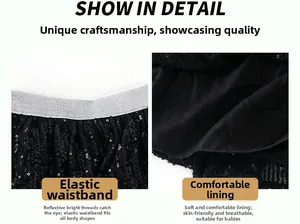 Detail view of girls black sequin skirt featuring elastic silver waist and soft lining