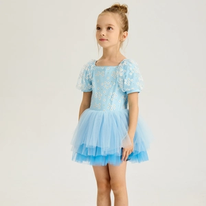 Detail of girls' light blue ballet dress featuring floral print and layered tulle tutu skirt