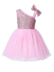 Sparkly pink girls party dress with one-shoulder sequined bow and layered tulle skirt