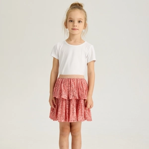 Detail of girls pink sequin layered tutu skirt with comfortable gold elastic waistband