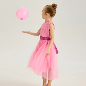 Detail of pink tulle layered girl dress with purple sequin belt and satin bow