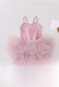 Detailed view of pink sequined girls ballet leotard with multilayered fluffy mesh tutu skirt