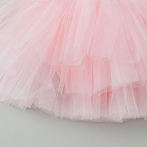 Macro detail of pink layered mesh tutu skirt for children dancing and ballet performance