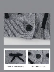 Vue détaillée du cardigan gris avec nœud noir et détails de boutons ronds classiques
