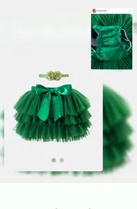 Detail of avocado green ruffled tutu skirt with satin bow and floral headband