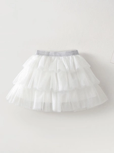White multi-layer mesh tutu skirt for girls featuring a silver elastic glitter waistband
