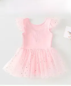 Detail of pink ballet tutu with rhinestone chest pattern and sequined star mesh skirt