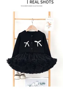 Ensemble cardigan en maille et jupe tutu avec broderies de nœuds blancs et chaussures Mary Jane