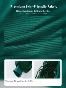 Close-up of dark green ribbed knit fabric and elastic cuffs on a girls' dress
