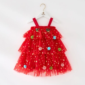 Detail of red tutu dress featuring gold star sequins and colorful pom-poms for girls
