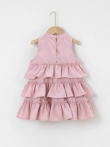 Pink sleeveless tiered ruffle dress for girls with back pearl buttons and bow detail