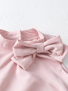 Pink tiered cake dress for girls with elegant bow detail on the neckline for autumn
