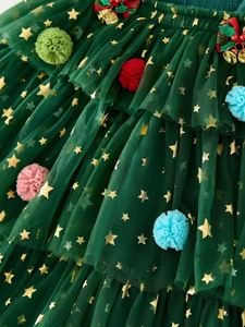 Festive toddler girls' green Christmas tutu dress with gold stars and velvet bows