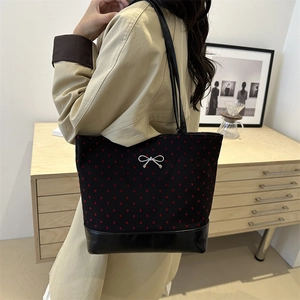 Polka dot tote bag with red hearts, leather trim and silver bow for daily commute