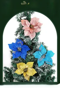 Glittering poinsettia artificial flowers on Christmas tree with lace hollow design