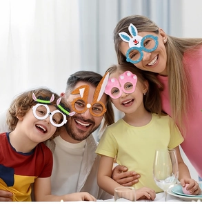 Family wearing sparkling Easter party glasses with rabbit ears and egg designs at home
