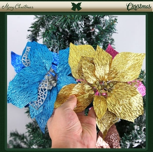 Close-up of 22cm dual-layer glitter Christmas flowers on a festive tree branch