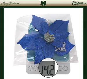 Blue textured Christmas poinsettia flower with silver glitter weighing 14.2g