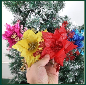 Close-up of colorful glitter artificial flowers for Christmas tree decoration
