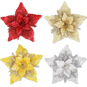 Glittery artificial poinsettia flowers set in red, gold, and silver for Christmas tree decor