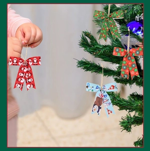 Detailed view of colorful Christmas bows with festive patterns on a Christmas tree