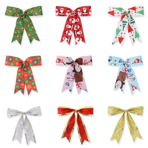 Mini glitter Christmas bows set featuring festive patterns and sparkling colors for DIY decor