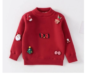 Detail of red Christmas sweater for kids featuring Santa Claus and reindeer patches
