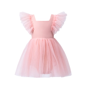 Detailed view of layered pink mesh ruffles and soft flutter sleeves on the baby dress