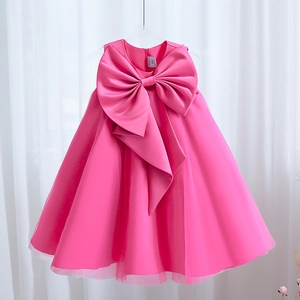 Pink girl princess dress with satin bow and layered tulle skirt for piano performance