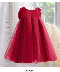 Rear view of red satin and tulle girl princess dress with invisible zipper and bow detail