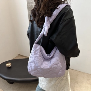 Chic light purple heart-quilted nylon dumpling bag with a unique knotted shoulder strap