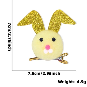 Easter plush bunny hair clip with yellow pom-pom and gold glitter ears measuring 7cm