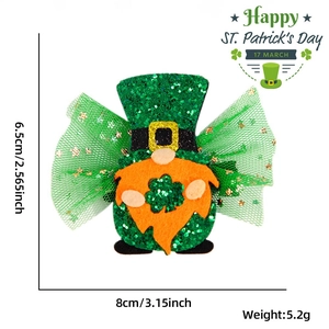 Close-up of St. Patrick's Day gnome clip with green sequins and orange felt beard details