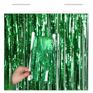 Close-up of green laser foil fringe curtain for Saint Patrick's Day party background