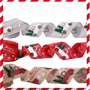 Detail of Christmas ribbons with car and tree patterns in red, grey, and burlap colors