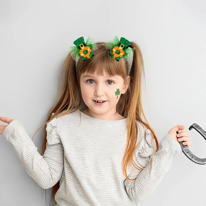 Saint Patrick's Day headband with green sequin mini hats and tulle on a young model