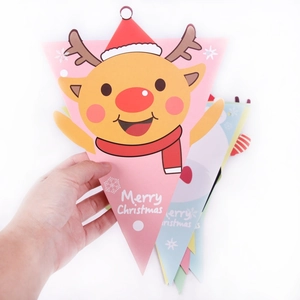 Close-up of pink Christmas triangle bunting with cute reindeer and Merry Christmas text