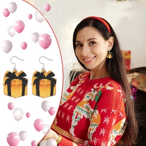 Boucles d'oreilles boîte cadeau argentées avec nœud orange pour les fêtes du Nouvel An